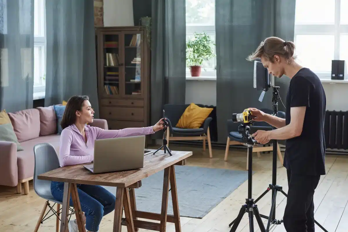 Operator shooting blogger running live stream